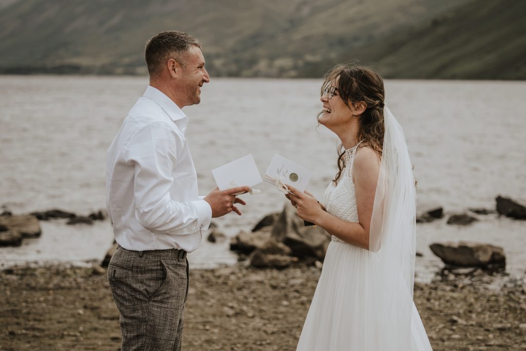 Private vows during an elopement at The Lake District.