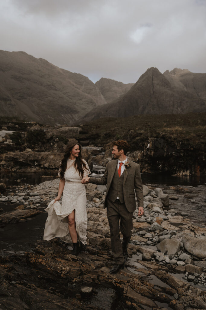 A couple eloping at The Fairy Pools on The Isle of Skye