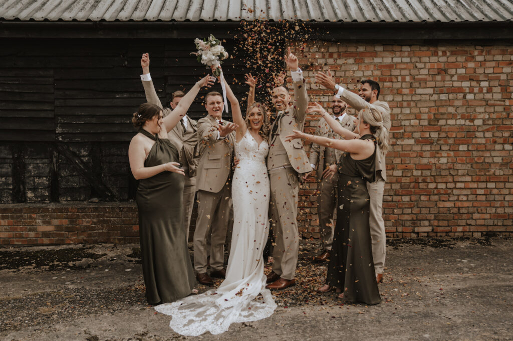 Milling Barn wedding photographer capturing confetti photos in Hertfordshire
