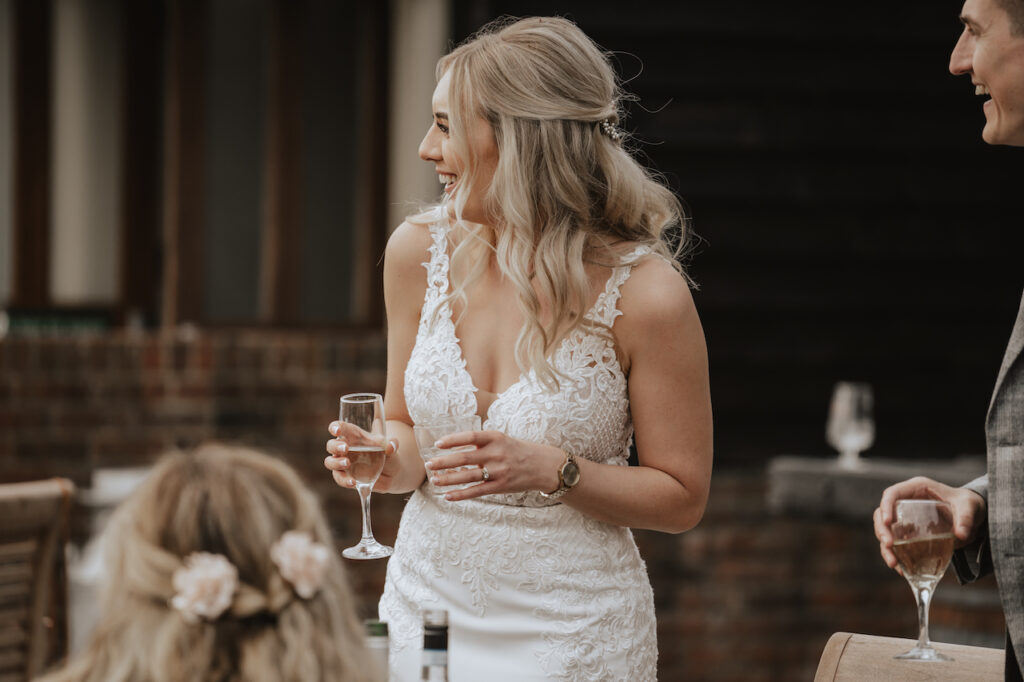 Hertfordshire wedding photographer capturing candid moments at Milling Barn