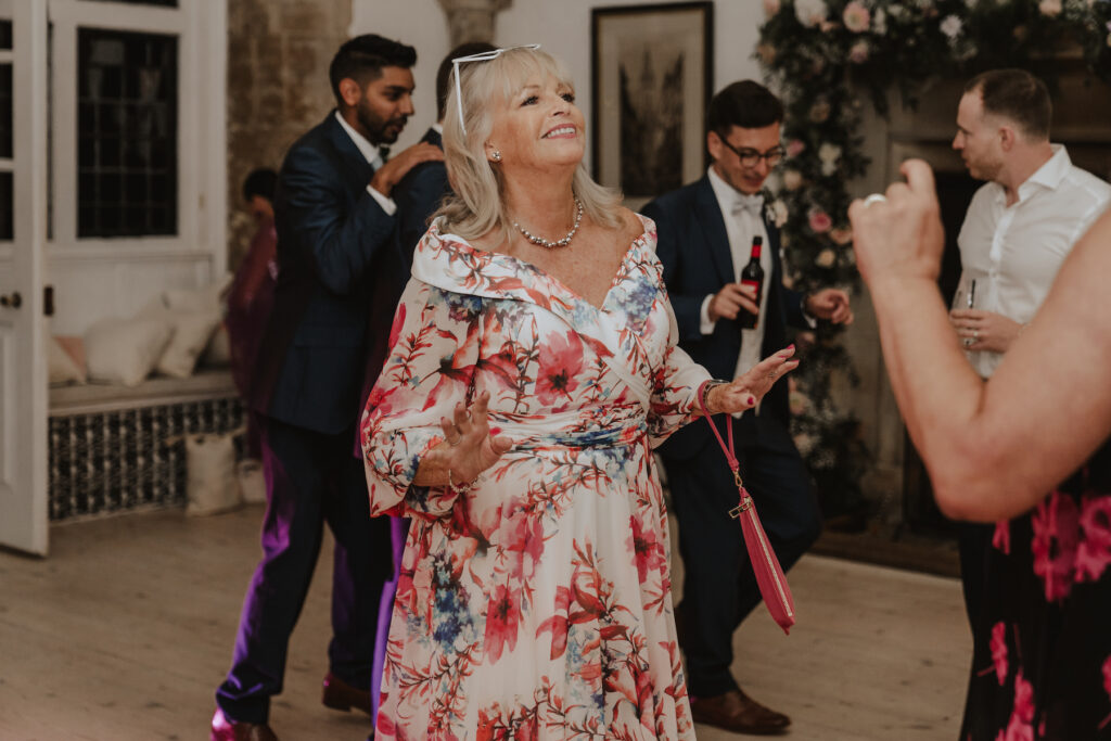 Suffolk wedding photographer capturing dance floor moments at Butley Priory
