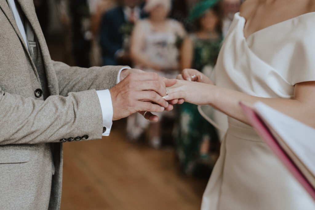 Ring exchange during the ceremony at Easton Grange