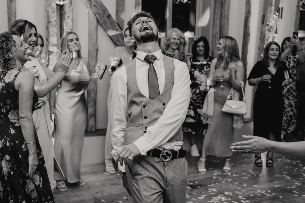 Suffolk wedding photographer capturing dance floor moments at Easton Grange