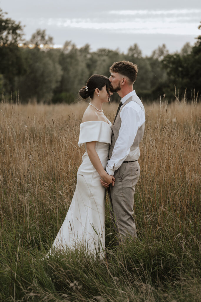 Suffolk wedding photographer at Easton grange capturing couples portraits