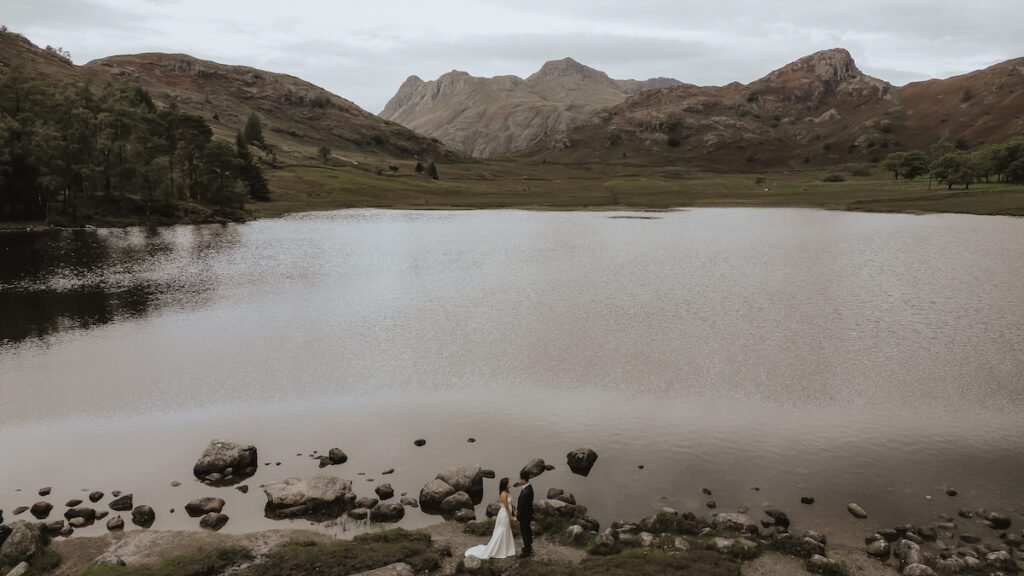 A couple reading their vows during their elopement day in the Lake District