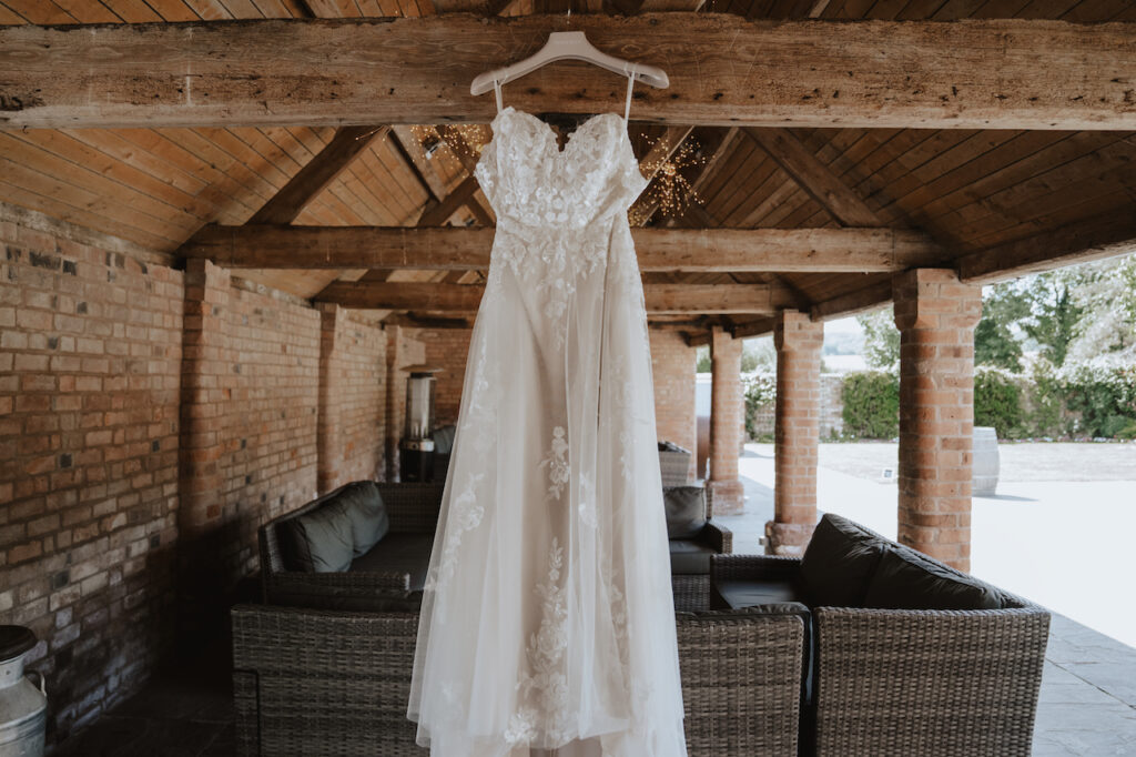 Wedding dress details during bridal prep at Swallows Nest Barn in the midlands
