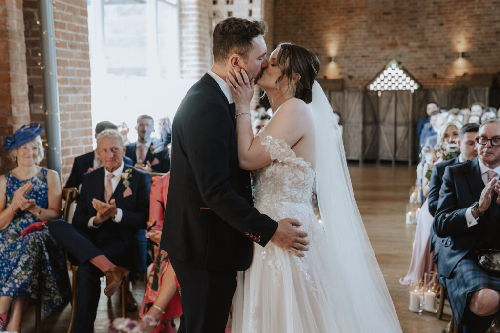 Katy and Tom's first kiss at Swallows Nest Barn