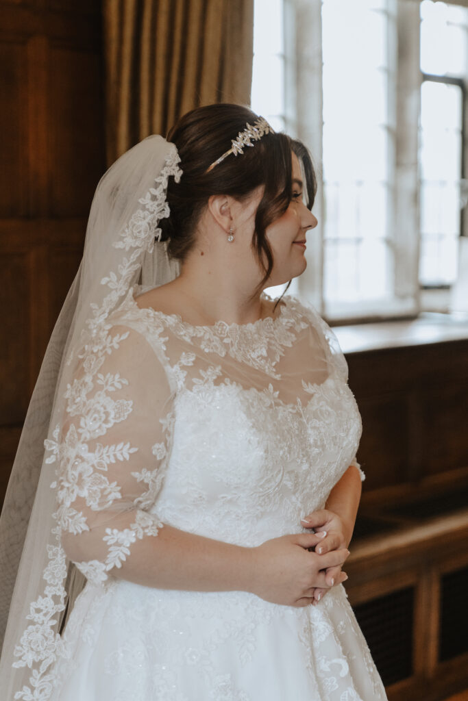 The bride at the bridal suite at Hengrave Hall