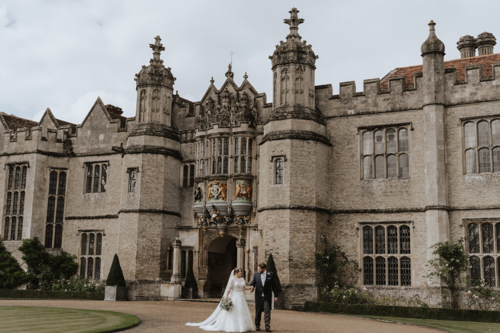 Couples portraits outside Hengrave Hall in Suffolk