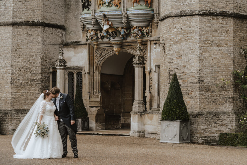 Suffolk wedding photographer capturing couples portraits outside Hengrave Hall