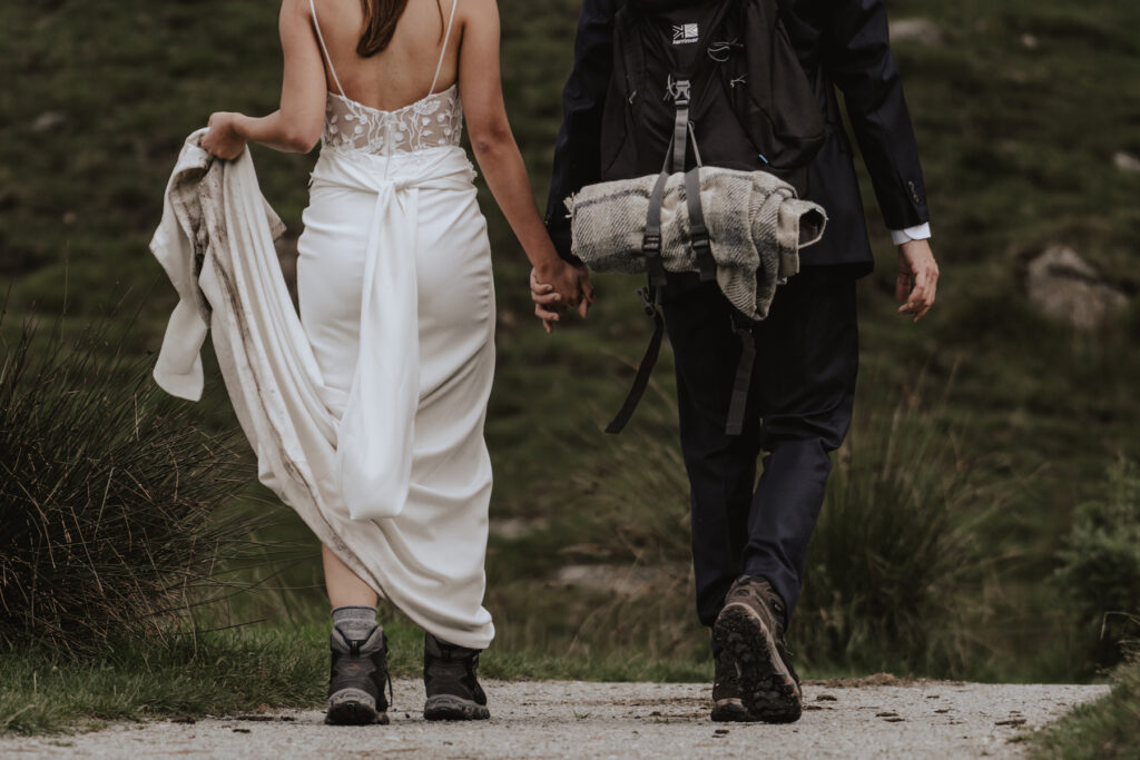 Lake District wedding photographer capturing a couple hiking on their Lake District elopement