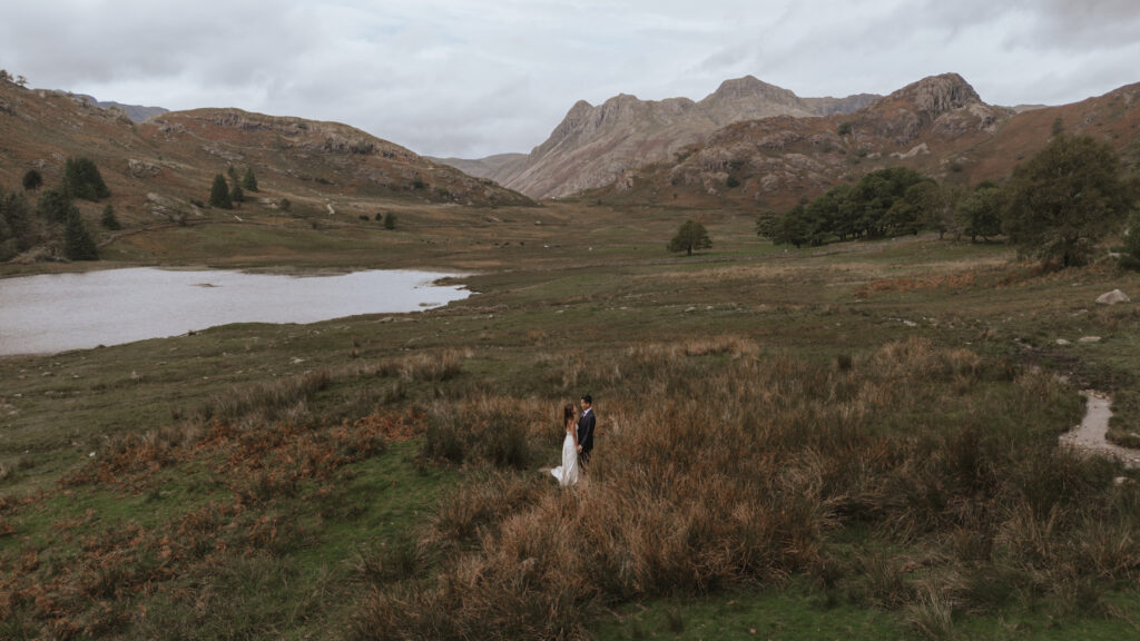 A couple eloping in the Lake District mountains