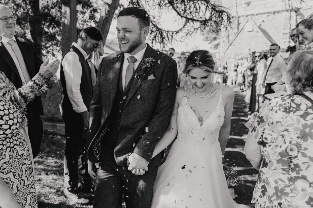 Midlands wedding photographer capturing a confetti moment