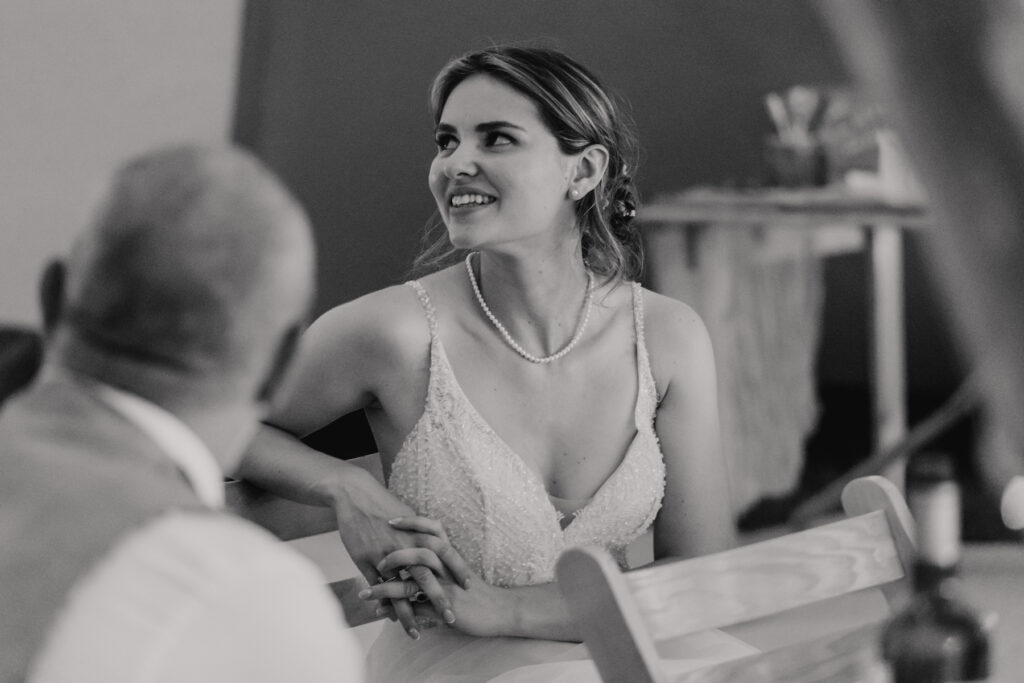 Candid reactions to speeches captured by a midlands wedding photographer