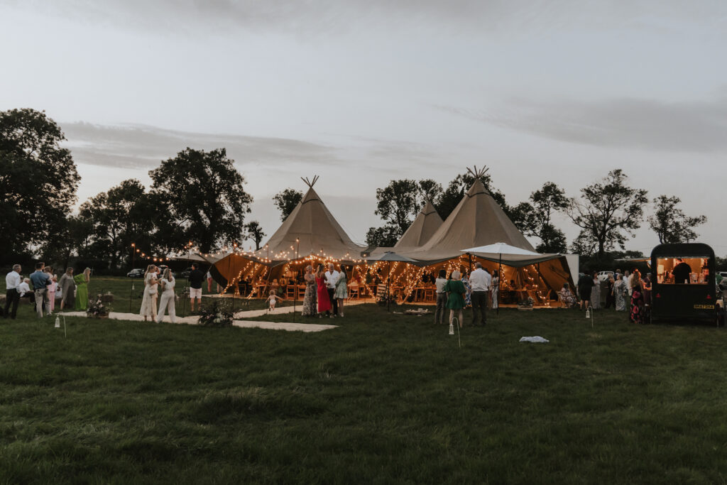 Midlands wedding photographer with the evening tipi and fairy lights