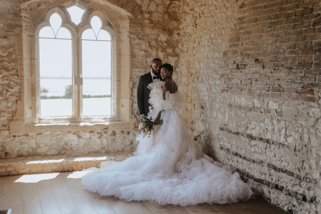 The bride and groom at Pentney Abbey in Norfolk