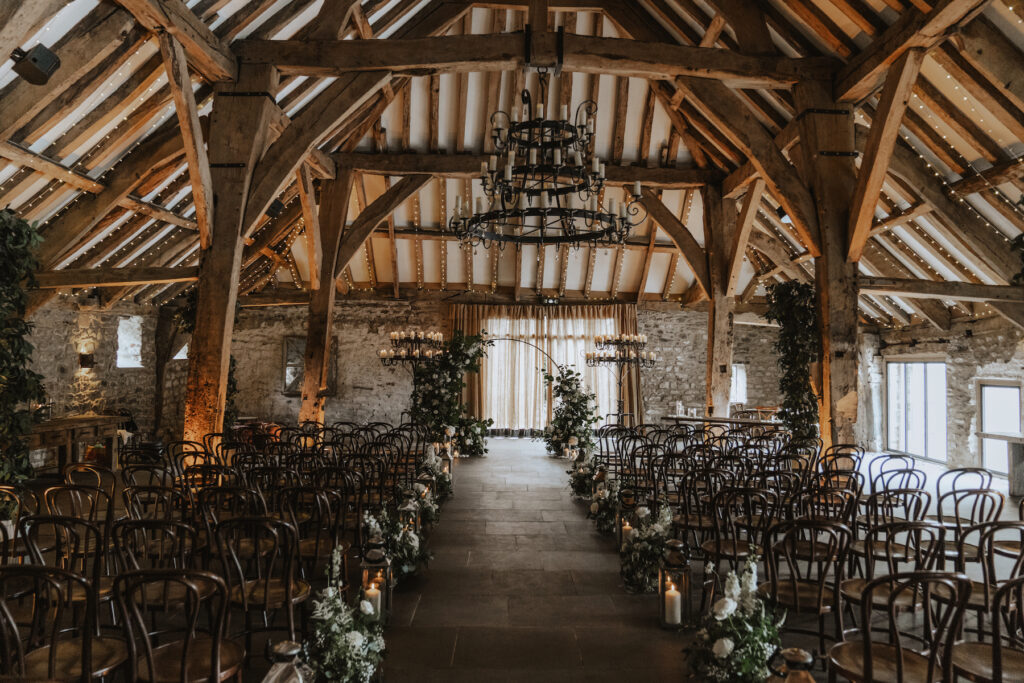 Yorkshire wedding photographer capturing the ceremony decorations at Tithe Barn in Skipton