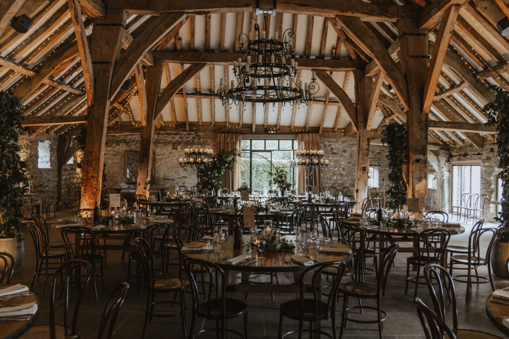 The wedding breakfast set up at The Tithe Barn in Skipton captured by a Yorkshire wedding photographer