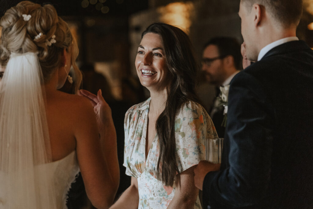 Yorkshire wedding photographer capturing candid photos of guests during their drinks reception