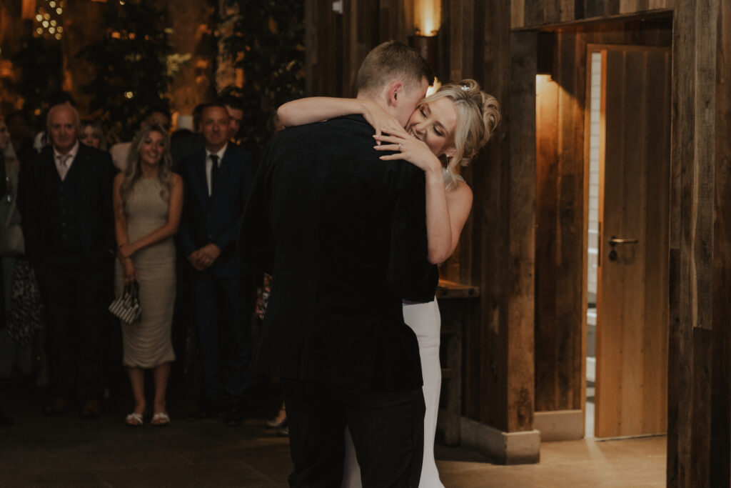 The couple having their first dance on the dance floor at Tithe Barn in Yorkshire