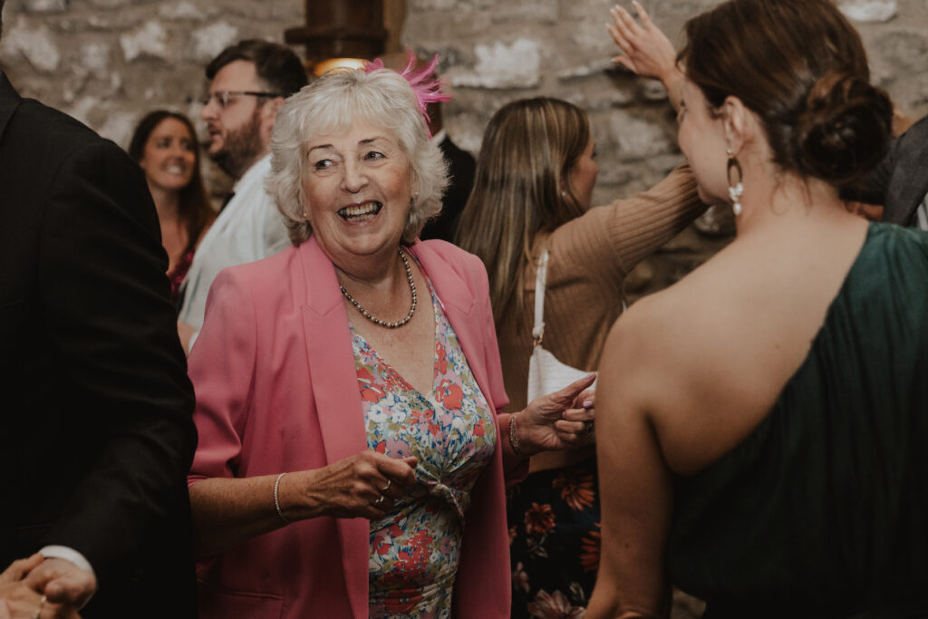 Dance floor moments of the guests at Tithe Barn in Yorkshire
