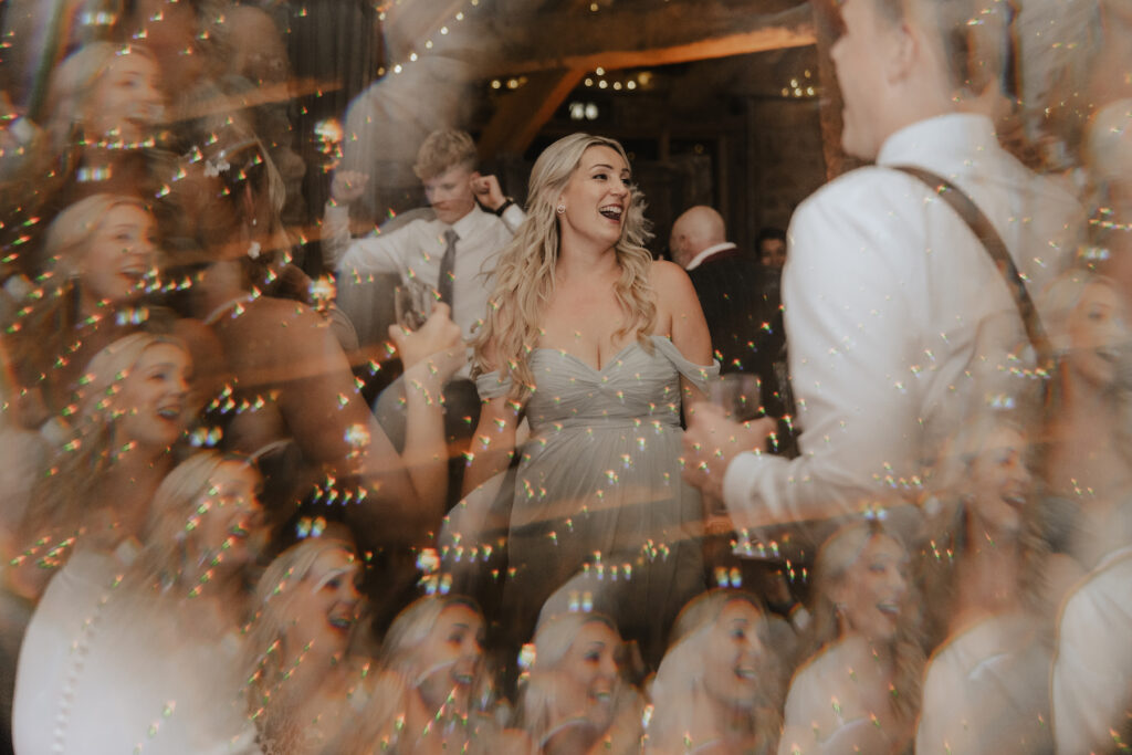 The dance floor evening reception at Tithe Barn captured by a Yorkshire wedding photographer