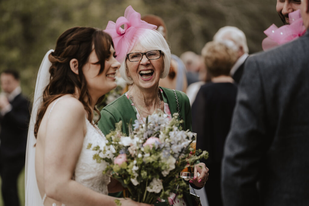 Candid moments during the couples drinks reception at Crockwell Farm