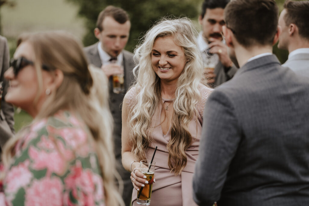 Candid moments captured during the drinks reception at Crockwell Farm