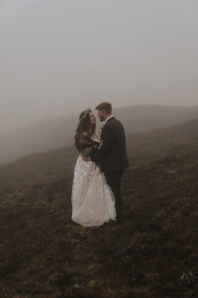 Eloping couple in the Isle of Skye during their wedding portraits at Quiraing