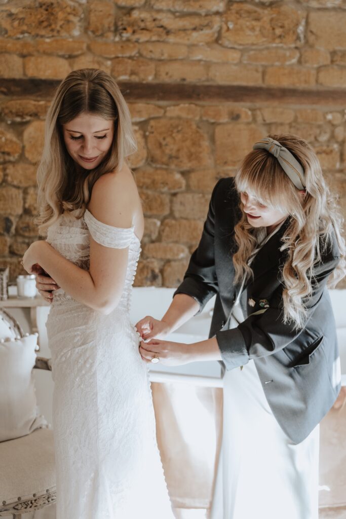 The bride getting ready in the bridal suite at Crockwell Farm in Daventry