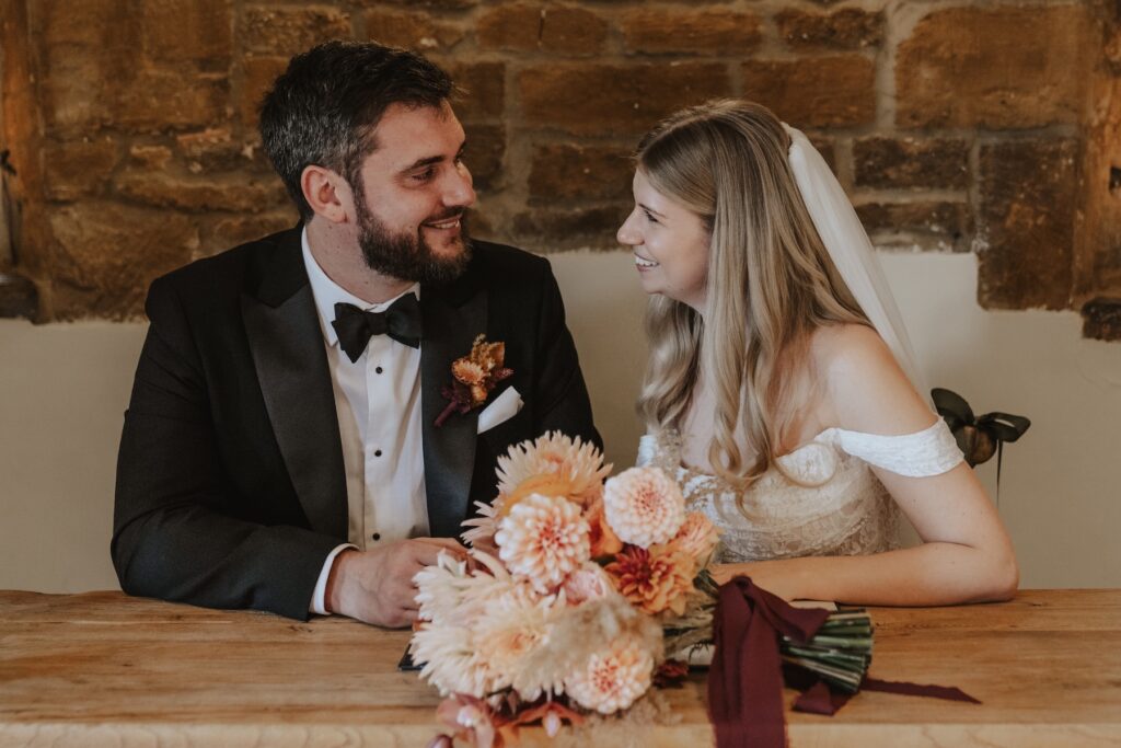 The couple signing the register after being officially married in Crockwell Farm