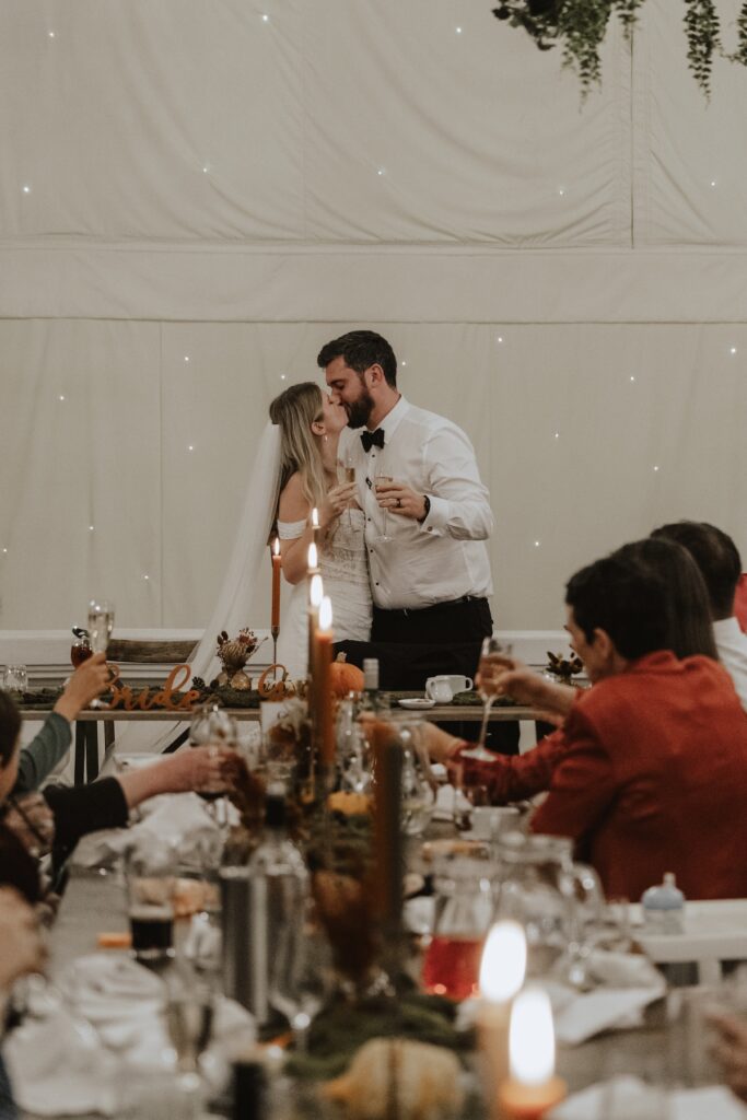 Wedding photographer in Northamptonshire capturing candid speeches of Crockwell Farm