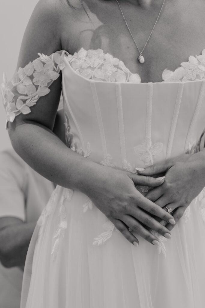 Essex wedding photographer capturing bridal prep details at Maidens Barn