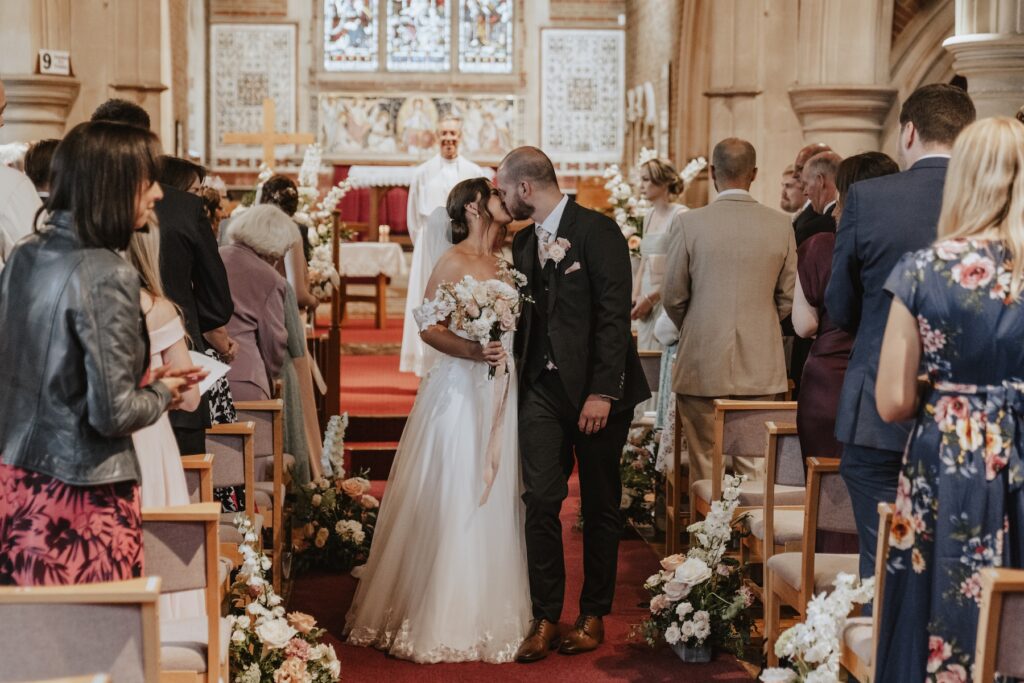 Ceremony moments captured by a wedding photographer in Essex