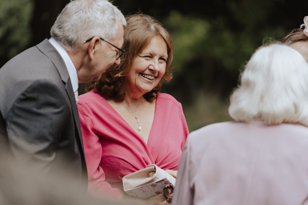 Essex wedding photographer capturing candids at Maidens Barn