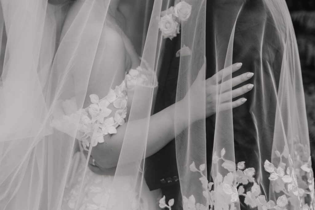 Small details during couples portraits at Maidens Barn in Essex