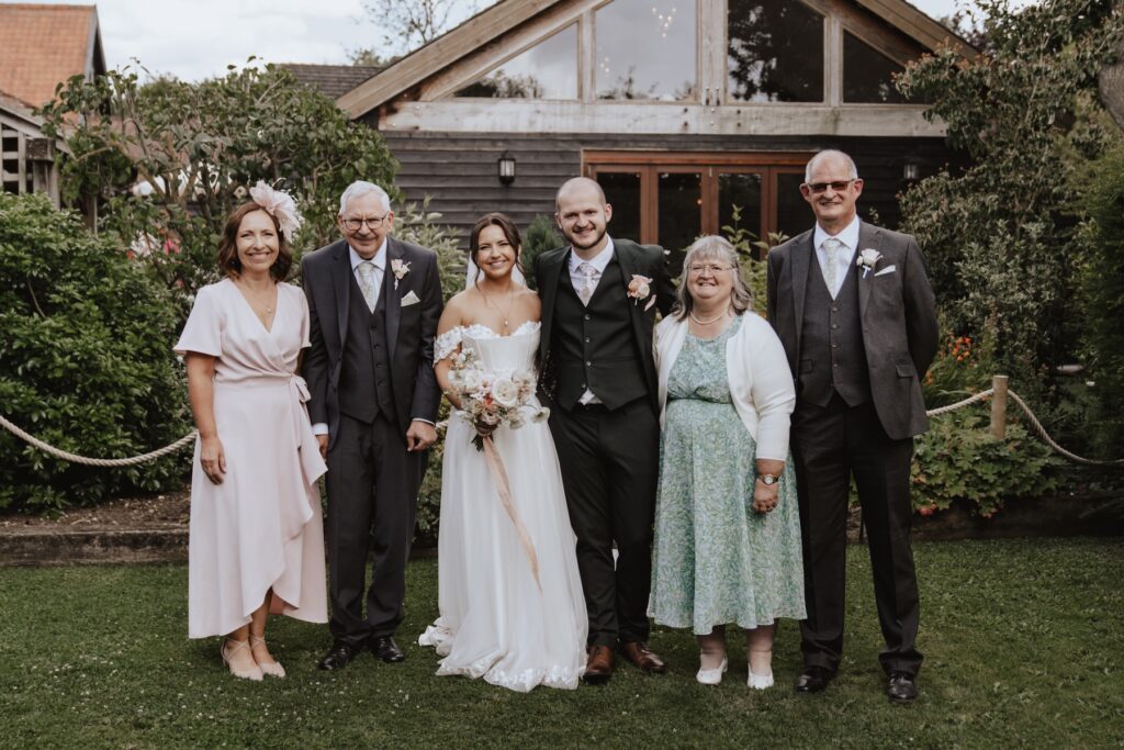 Formal photos during drinks reception at Maidens Barn in Chelmsford