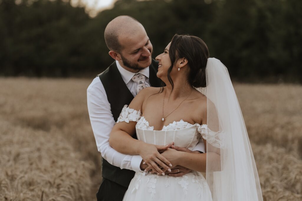 Essex wedding photographer capturing evening portraits at Maidens Barn in Essex