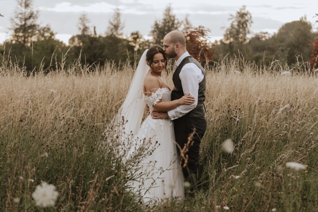 Essex wedding photographer capturing evening portraits at Maidens Barn in Chelmsford