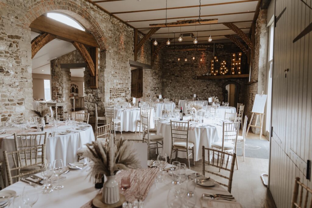 The wedding breakfast room at Pentney Abbey captured by a wedding photographer in Norfolk