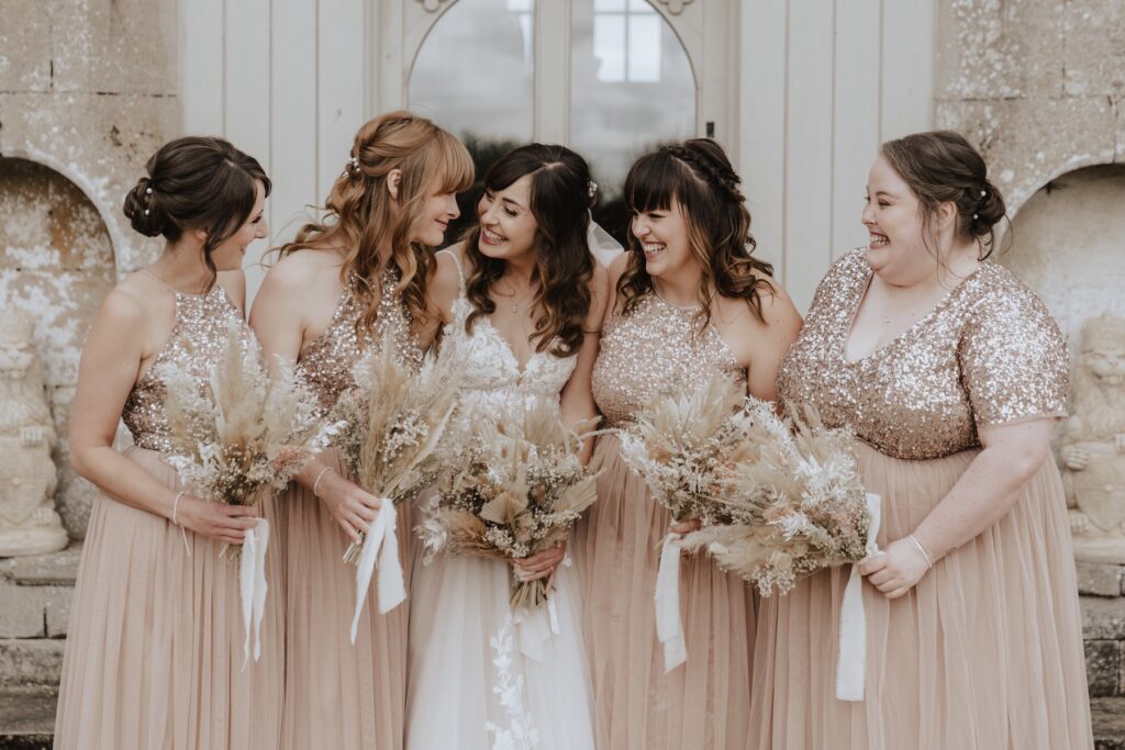 Wedding photographer in Norfolk capturing bridesmaids portraits at Pentney Abbey