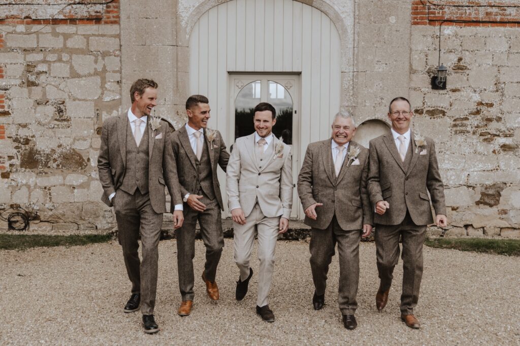 Pentney Abbey wedding photographer capturing groomsmen in Norfolk