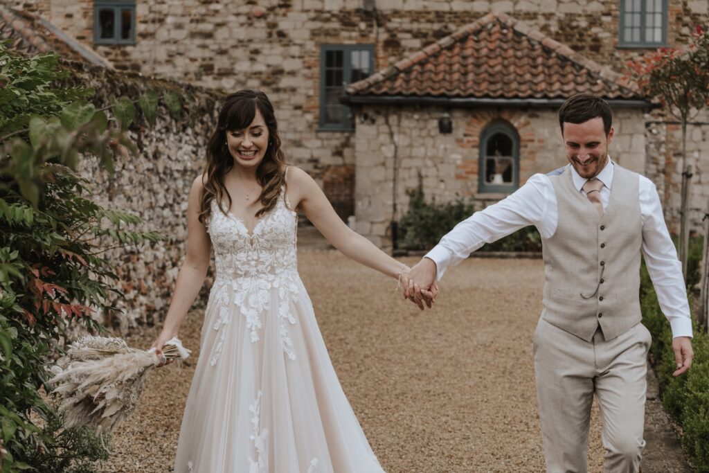 Evening portraits of a couple newly married at Pentney Abbey in Norfolk