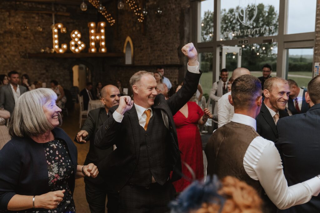 Pentney Abbey wedding photographer capturing guests on the dance floor
