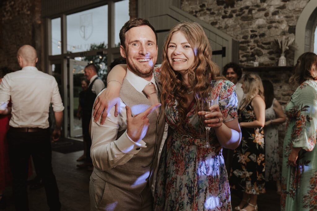 Norfolk wedding photographer capturing dance floor moments with guests at Pentney Abbey