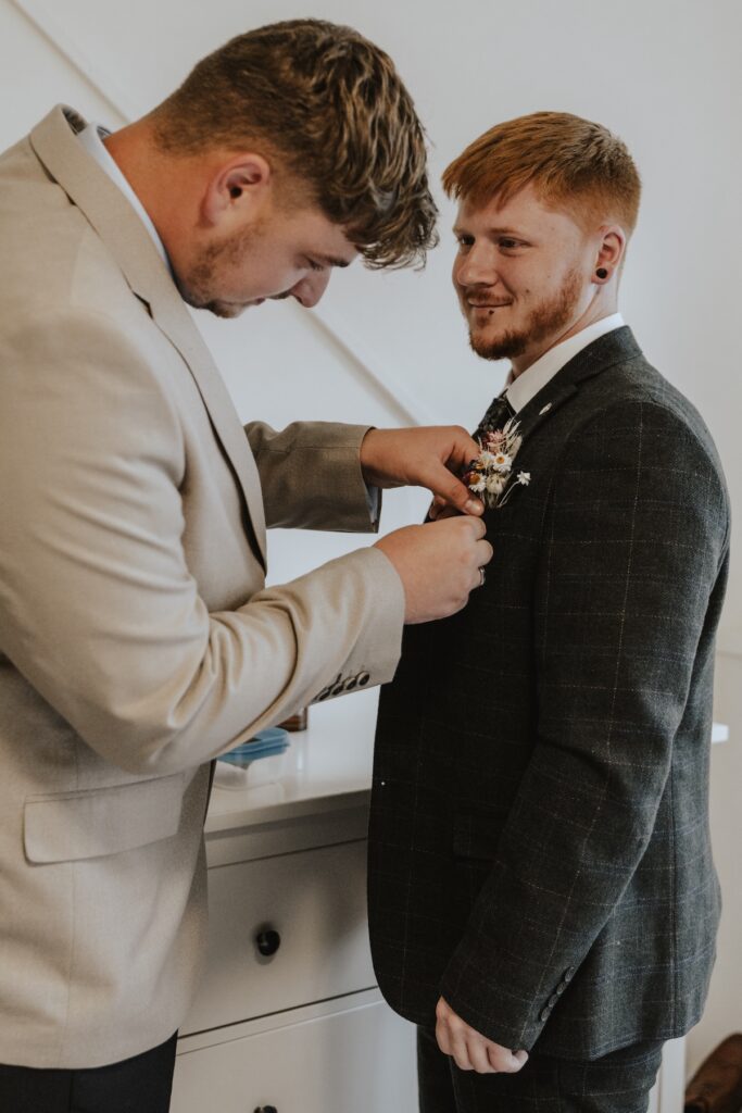 Elopement photographer in Scotland capturing the grooms prep on the morning of their Isle of Skye elopement