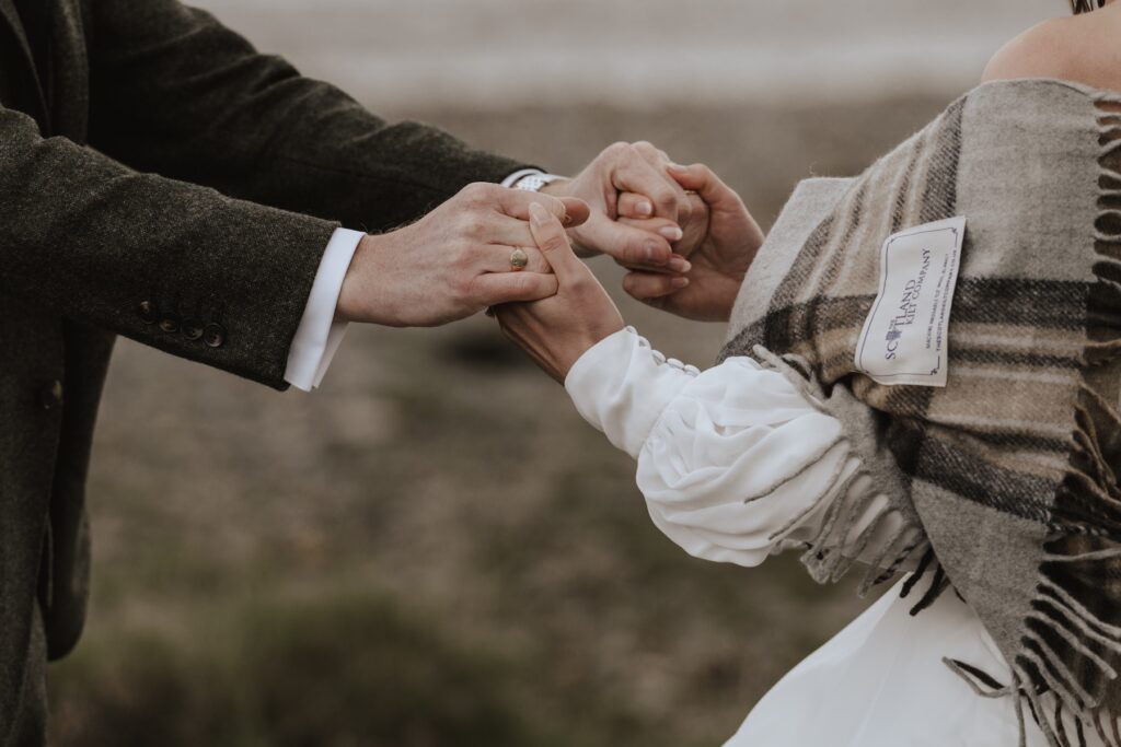 Moments of a couple during their Scotland elopement