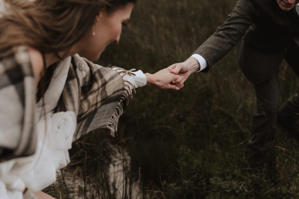 The couple adventuring on their Scotland elopement