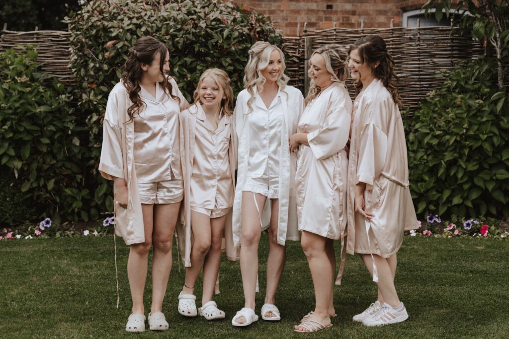 The bride and her bridesmaids at Swallows Nest Barn in Warwick