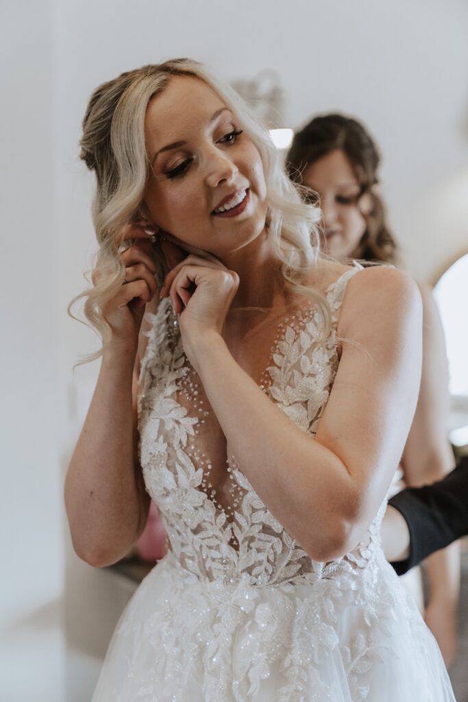 The bride getting ready at Swallows Nest Barn in Warwick
